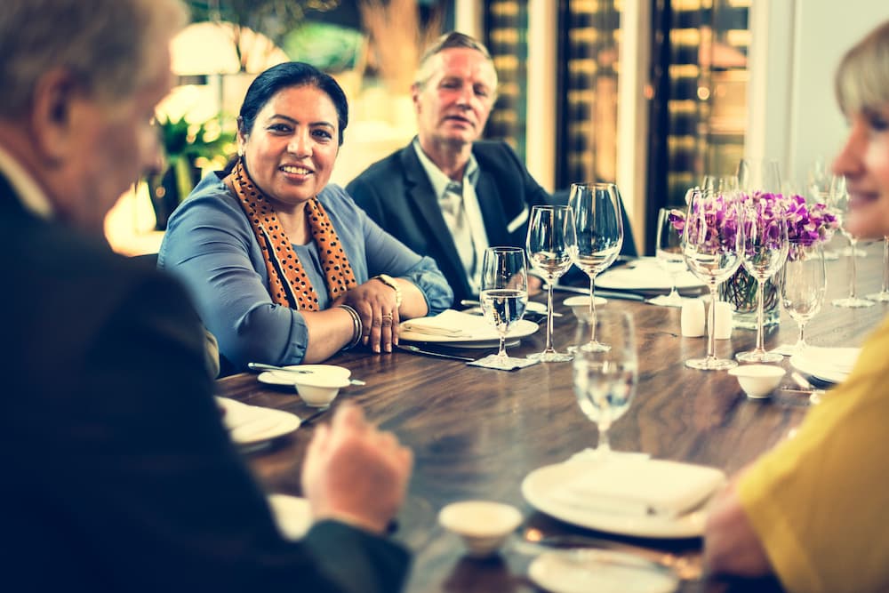 Advisers working with a hospitality leadership team
